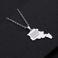 Macro shot of silver Armenia map pendant on a black textured background - Steel Engraved Style B / Steel