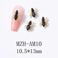 Macro detail of gold spider nail charms with black rhinestones for Halloween nail art - Gold Base Black Rhinestone (AM10)