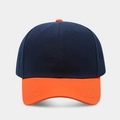 Front view of navy blue and orange color-block baseball cap in durable cotton twill fabric - Navy + Orange Brim