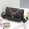 Elegant black glitter crossbody bag with gold heart lock and embroidered shoulder strap - 21x8x14cm / Black