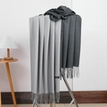Soft light grey and dark grey cashmere scarves with fringes on a metal display rack - No.33 Light Grey Dark Grey
