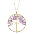 Detailed close-up of tree of life pendant with purple crystals and gold wire wrapping - Gold + Amethyst