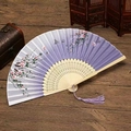 Detail of Chinese folding fan with purple cherry blossom print and carved bamboo ribs - Purple Peach Blossom