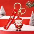 Portachiavi Babbo Natale carino con cinturino in silicone rosso e anello dorato - Babbo Natale - Zaino verde