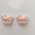 Close-up of pink plush bear badges with strawberry embroidery for JK uniforms - Accessory Patch (No Pin) / Curly Pink Bear with Strawberry
