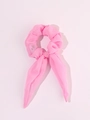 Close-up of pink LED scrunchie with bow made of sheer tulle fabric for Christmas - Lighted Rabbit Ears-Pink