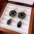 Close-up of vintage black teardrop earrings with crystals on a jewelry box liner - 11# Silver Earring Post - Silver - Black - Water Drop Enamel