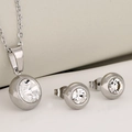 Minimalist silver stainless steel jewelry set featuring round clear gemstone necklace and studs - Steel Color + White Zirconia
