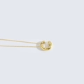 Elegant gold horseshoe necklace featuring delicate white pearls in a minimalist design - Letter C
