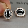 Elegant rose gold oval black gemstone earrings with halo white crystal details - Rose Gold Black