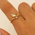 Detailed close-up of a golden bird crown ring with a sparkling zircon on a branch band - Crown Bird With White Rhinestone Style (WG-0272)