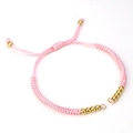 Adjustable pink braided Milanese rope bracelet with decorative polished gold beads - Pink