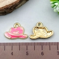 Pink enamel cowboy hat charms in gold alloy, shown with scale for sizing reference - Pink Cowboy Hat (21853)