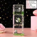 Panda quicksand desktop ornament with green liquid and Good Luck message in rectangular tube - Panda Triple Column Quicksand Ornament