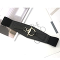 Dettaglio di cintura elastica nera a corsetto con inserto in pelle e fibbia oro - Nero