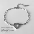 Polished silver stainless steel paperclip bracelet with hollow heart charm and extension - Hollow Heart Pendant Paperclip Chain (XBL0021-1)