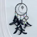 Handmade black dream catcher with moon crescent design and soft natural feathers - Finished Product / Starfall