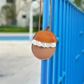 Detail view of acorn-shaped kids bag with lace trim and brown PU leather texture - Pine Cone Pink Apricot