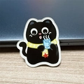 Cute black acrylic cat brooch wearing a striped scarf and holding a warm blue cup - Scarf and Cup Cat