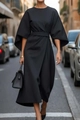 Close-up of black batwing sleeve dress with waist belt on European street - S / Black