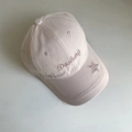 Close-up of Dashing embroidery and plaid star patch on pink cotton baseball cap - M (56-58cm) / Pink