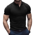 Close-up detail of high-quality black pique cotton polo shirt with three-button collar - Black