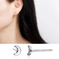Minimalist S999 sterling silver moon stud earrings shown on model and in detail view - Moon Stud Earrings