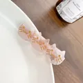 Pink acetate hair clip featuring three sparkling cats with golden facial details - 6.5cm / Peach Pink
