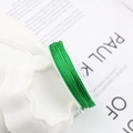 Bright green braided cord on white spool for jewelry making and handmade crafts - 10m / Grass Green