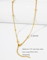 Macro detail of 18k gold plated 316L stainless steel chain with 1.6mm beads - HC0024G1645-Side Wrapped Bead Chain