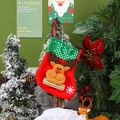 Detail of red Christmas stocking with 3D reindeer hanging on a festive decorated tree - Sequin Sock - Reindeer