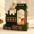 Lanterne boule à neige train vintage verte avec figurine Père Noël et détails dorés - Train Rempli d'eau avec Lumière / Vert