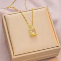Elegant gold-plated titanium necklace featuring a rectangular clear stone pendant in a box - 6041 Rectangle White Zircon / Gold White Zircon
