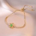 Adjustable gold bracelet with emerald green gemstone flower and white cubic zirconia - Emerald Flower Bracelet / Gold