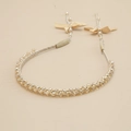 Elegant gold and beige crystal beaded headband with ribbons for stylish women - Champagne