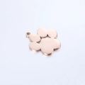 Macro view of rose gold animal paw pendant with polished mirror finish and thick edge - Rose Gold