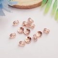 Detail of rose gold beads with crystal micro-pave insets for DIY jewelry crafting - 6mm Pave Rhinestone / 10 Pieces Pack / Rose Gold