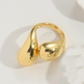 Detailed side view of a gold adjustable ring featuring a unique molten liquid drop design - Water Drop / Gold