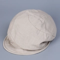 Detail van de ademende linnen textuur en stiksels van deze beige platte pet voor dames - M (56-58cm) / Beige