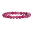 Detailed view of magenta natural stone beaded bracelet with polished round gemstone beads - Rose Red