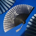 Classic dark blue folding fan with white floral patterns and elegant silver tassel - Grey Blue Flower Butterfly