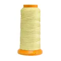 Light yellow braided cord for DIY jewelry on a bright orange plastic spool - Beige