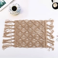 Hand-woven bohemian table runner with diamond patterns and fringe on white desk - Hemp Rope Mat