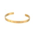 Bracciale rigido in acciaio dorato con zirconi e dettaglio a stella inciso - Bracciale Aperto Sole Con Quattro Piccoli Zirconi Tondi