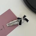 Elegant silver hair clip featuring a black enamel bow on a stylish pink gift card - Silver/Black-Enamel Bow