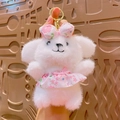 Adorable porte-clés chiot en peluche blanche avec robe rose fleurie et nœud coloré - Chiot en Robe Florale / Rose