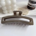 Elegant dark brown tortoiseshell acetate hair claw clip with golden Barrette La France logo - Light Coffee