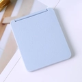 Miroir de maquillage pliable portable bleu clair mat avec design rectangulaire compact - Bleu