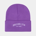Detail of purple knit beanie with white Brooklyn EST 1631 embroidery and ribbed texture - Purple