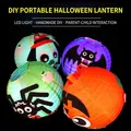 DIY Halloween paper lanterns with LED lights featuring ghost and spider patterns - Halloween Glowing Lantern